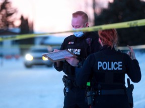 Police at the scene of Saskatoon's first homicide of 2021.