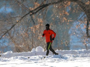 A man runs along the Meewasin Trail on Jan. 7.
