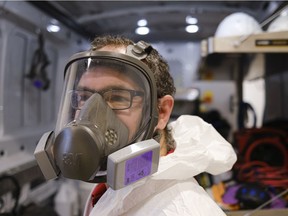 Greg Stephenson, co-owner of PuroClean Restoration Regina, poses in a tyvex suit and face mask. Among the company's services are preventative cleaning for COVID-19, and disinfection of places with outbreaks.