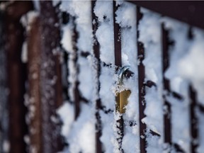 Frost builds up around a padlock attached to the stairwell leading up to the Train Bridge as temperatures dipped below -30 degrees Celsius in Saskatoon, SK.