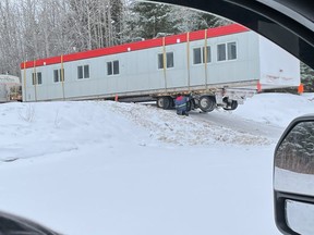 Residents of La Loche rallied together on Jan. 27 to help a trucker who became stuck while driving into the community on a winter road witha COVID-19 isolation unit in tow. Photo by Brenda Janvier. Provided Jan. 29, 2021.