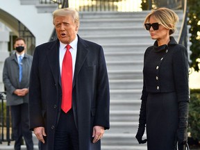 US President Donald Trump and First Lady Melania Trump depart the White House in Washington, DC, on January 20, 2021.