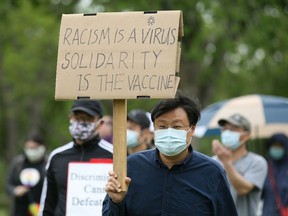 Attendees at a rally against racism towards the Chinese community during the COVID-19 pandemic. Photo taken in Saskatoon, SK on Sunday, June 14, 2020.