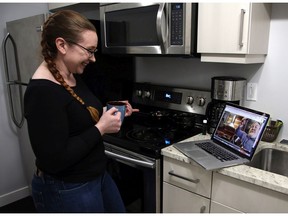 Bronwyn Stoddard, who lives in Saskatoon, teaches a brownie recipe to her fiance Jonathan Reilly through video chat. Reilly lives in Los Angeles and border restrictions have made visiting complicated.