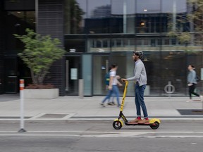 A man rides one of Roll Scooters' electric scooters in an undated handout photo supplied to the Saskatoon StarPhoenix by the Toronto-based startup.