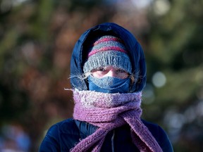 "This is the first time I ever had icicles on my eyebrows," said Reanne Sereda as walked by the South Saskatchewan River.