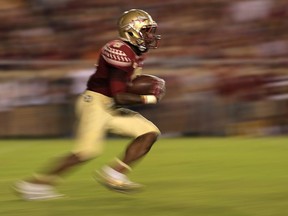 Former Florida State Seminoles speedster Kermit Whitfield has signed with the Saskatchewan Roughriders.