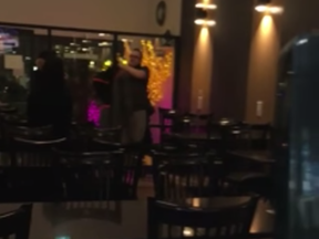 A screen shot of a video posted to Facebook on Feb. 3 apparently showing a man cursing and using racial slurs against staff at a Saskatoon restaurant.