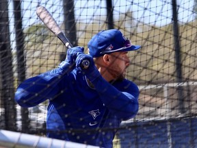 Toronto Blue Jays outfielder George Springer takes batting practice during spring training.