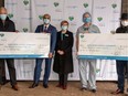 Philanthropists Eric, left, and Jennifer Martin, and Ray Bergen, right, donated $30,244 to buy equipment for a new hip arthroscopy program at Eagle Ridge Hospital. The new program is headed by Dr. Parth Lodhia, second from left.