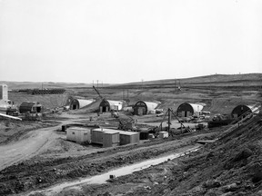 A photo of tunnels built to divert the waters of the South Saskatchewan River during construction of what would become the Gardiner Dam, from March 25, 1961.