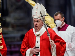 Pope Francis holds a mass on Palm Sunday, amid COVID-19 restrictions, in St. Peter's Basilica at the Vatican, March 28, 2021.