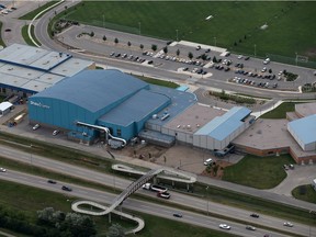 A COVID-19 outbreak has been declared at Tommy Douglas Collegiate, seen here in a 2014 aerial photo to the right of the Shaw Centre in Saskatoon.