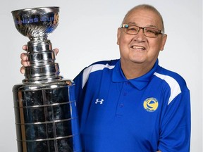 Bobby Kirkness holds the the Kirkness Cup. Photo by Steve Hiscock / Saskatoon Blades