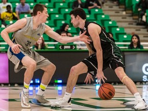 Addison Dewar, right, shown here in Ron and Jane Graham Shootout action in 2019, still has another year of U Sports eligibility remaining should he choose to return next season.