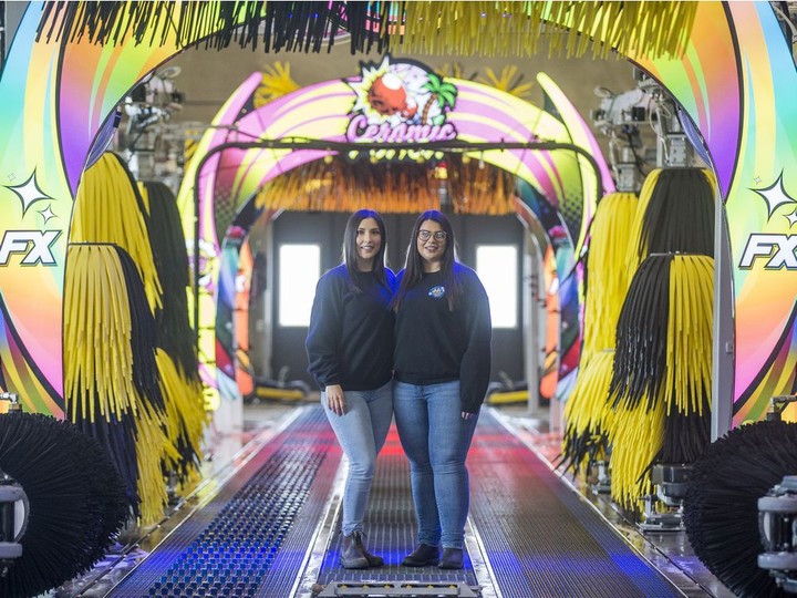  Sisters Jacoba, left, and Jamille Taylor opened JJ’s Express Oil Change & Car Wash. The car wash is designed to be an experience similar to a carnival ride, with coloured soaps and lights.