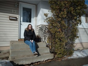 Gillian Isabelle sits at her home in Regina, Saskatchewan on Mar. 6, 2021. Isabelle tested positive for COVID-19 early in the pandemic and says she's still dealing with some of the after effects.