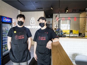 Mike Wang, left, and Ryan Liang are two of four co-owners of Hey! Fried Chicken.