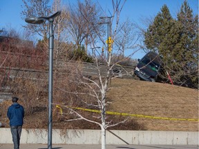 0328 news sps collision. One person was transported to hospital after a vehicle drove onto a lower pedestrian path near Spadina Crescent between Avenue A and Avenue B on March 27, 2021. (Kayle Neis).