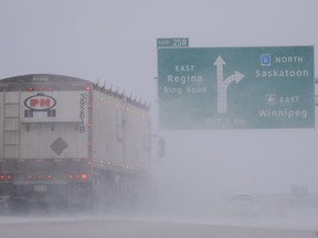 A truck travels toward Regina on the Trans-Canada Highway. A winter storm arrived in the early afternoon.