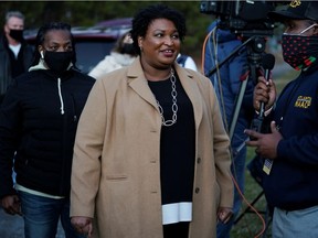 FILE PHOTO: Stacey Abrams speaks to the media about U.S. Senate runoff elections outside St. Paul's Episcopal Church in Atlanta, Georgia, U.S., January 5, 2021.  REUTERS/Elijah Nouvelage/File Photo