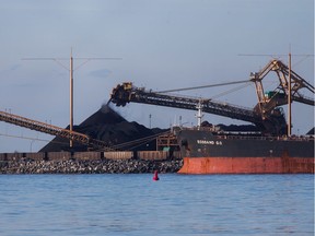 A conveyor moves coal into a pile at the Westshore Terminals Ltd. export terminal in Delta, British Columbia, Canada, on Wednesday, Feb. 6, 2019. Export Development Canada announced in January that it will no longer provide any funding for thermal coal, as the country transitions towards cleaner energy sources. (Ben Nelms/Bloomberg)