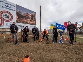 General manger of Prairie People Métis Economic Development Corporation Kelly Pruden, director of housing with Métis Nation Saskatchewan Christena Konrad, Métis Nation Saskatchewan vice-president Gerald Morin, Regional director for Western Region II-A Penny Hurton, President of the Central Urban Métis Federation Inc. Shirley Isbister, and Mayor Charlie Clark (left to right) break ground at a sod turning event for the Round Prairie Elder's Lodge affordable housing development for Métis elders. Photo taken in Saskatoon, SK on Friday, April 23, 2021.