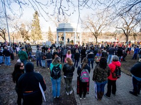 People gathered at Vimy Memorial to protest mandatory mask laws and the government's handling of the COVID-19 pandemic on March 20.