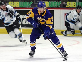 Saskatoon Blades' Wyatt McLeod (19) vs. Winnipeg Ice at the Brandt Centre on March 31, 2021. Keith Hershmiller Photography.