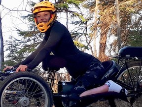 Lisa Franks on the current style of adaptive mountain bike in her rental club. She is trying to raise money for new bikes that accommodate a wider range of mobility issues. (Supplied photo)