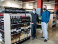 Manager Cam Werezak, left, and director of retail Jason Allen are part of the team at The Patch Wine and Spirits, which is the first Indigenous owned liquor store on an urban reserve in Saskatchewan. They offer a "Proudly Indigenous" section, featuring products from Indigenous owned companies. Photo taken in Saskatoon on April 6, 2021.