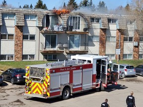 Firefighter respond to a fire at an apartment building in the 3800 Block of Chaben Place. Photo taken in Saskatoon, SK on April 10, 2021. (Matt Olson/Saskatoon StarPhoenix)