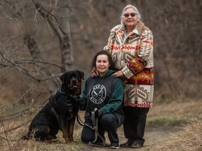 Holly Graham, centre, is the research head of a University of Saskatchewan project to connect Cree youth on Little Pine First Nation and Poundmaker Cree Nation with their culture. She is pictured with her mother Celia Wapass-Clennell and dog Kai. Photo taken in Saskatoon, SK on Tuesday, April 13, 2021.