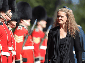 Newly sworn in Governor general Julie Payette inspects the honour guard at Rideau hall in Ottawa, October 2, 2017.
