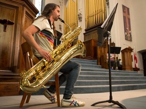 Gerard Weber plays the bass saxophone in a rehearsal at Knox United Church for a special concert featuring the lowest acoustic instruments with the Strata New Music Festival. Photo taken in Saskatoon on May 18, 2021.