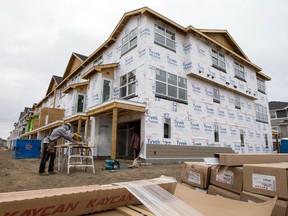 A carpenter works on a housing project in Stonebridge. The amount of housing starts in the Saskatoon region more than doubled in April compared to the year before, making it one of the hottest markets in Canada. Photo taken in Saskatoon on May 19, 2021. (Saskatoon StarPhoenix / Michelle Berg)