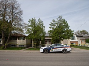 Saskatoon police at the scene where an injured person was found in the 200 block of Whitney Ave. N. Photo taken in Saskatoon on May 31, 2021. (Saskatoon StarPhoenix / Michelle Berg)