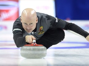 Kevin Koe, shown at the 2017 Canadian Olympic curling trials, has a return trip booked in 2021. The Canadian Press/Adrian Wyld