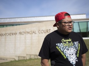 Brett Herman, half brother of the deceased Braden Herman, speaks to the media outside the Saskatchewan Provincial Courthouse in Prince Albert, Sask., on Tuesday, May 13, 2021. Corporal Bernie Herman, a 32-year member of the RCMP, is accused of killing 26-year-old Braden Herman.