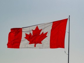 The Canadian flag stretched out in the wind on Monday, February 15, 2021.