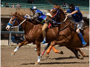 Joseph Jackson (second from right) competes in the home opener Indian Relay Races at Marquis Downs in Saskatoon on May 30, 2021. (Saskatoon StarPhoenix / Michelle Berg)