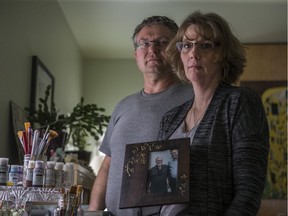 Carey Rigby-Wilcox, right, and Rich Wilcox, are pictured at their home near Pike Lake in January 2020. Their son, Steven Rigby died in an officer-involved shooting in December 2018. An inquest into his death begins June 21.