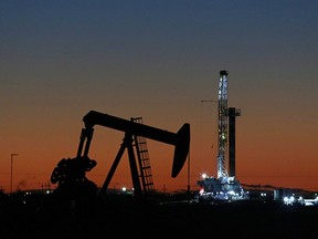 An oil rig and pump jack in Texas.