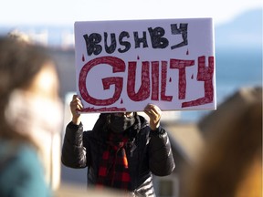 Protesters under the "Not One More Death" banner march toward the old courthouse ahead of the second day of the manslaughter trial for Brayden Bushby in Thunder Bay, Ont., Tuesday, Nov. 3, 2020. Bushby, 21, threw a trailer hitch at Barbara Kentner, a First Nations woman who died several months after the 2017 assault.