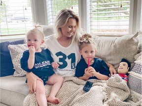 Angela Price, the wife of Canadiens goalie Carey Price, gets ready to cheer him on along with their daughters Liv, 4, and Millie, 1, from her parents' home in Kennewick, Wash., during 2020 NHL playoffs.