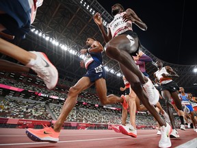 Mohammed Ahmed of Team Canada competes in the Men's 10,000m Final on day seven of the Tokyo 2020 Olympic Games at Olympic Stadium on July 30, 2021 in Tokyo, Japan. (Photo by Matthias Hangst/Getty Images)