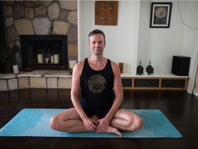 Bodhi Tree yoga co-owner Colin Hall stands in front of the yoga studio in Regina on July 5, 2021.