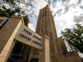 A "for sale" sign in front of the Third Avenue United Church in Saskatoon on Friday, June 9, 2017.