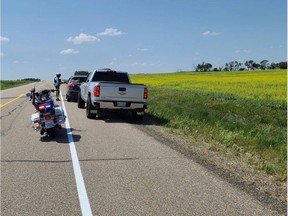 A Saskatchewan RCMP Combined Traffic Services Saskatchewan Motorcycle Officer pulls over vehicles. The officers were involved in a four-day enforcement blitz in west-central Saskatchewan from July 8-11.