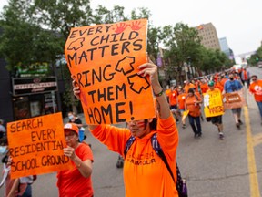 The streets of downtown Saskatoon were flooded with orange shirts and signs during a Truth and Reconciliation Calls to Action Awareness and Education Walk.